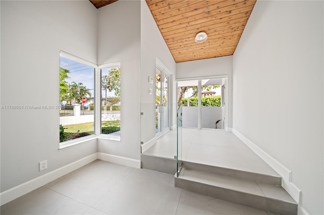 6881 SW 94th Ave, Miami, FL 33173 - entryway with plenty of natural light, wooden ceiling, baseboards, and high vaulted ceiling