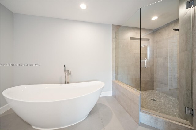 6881 SW 94th Ave, Miami, FL 33173 - full bathroom featuring a shower stall, a freestanding bath, baseboards, recessed lighting, and tile patterned floors
