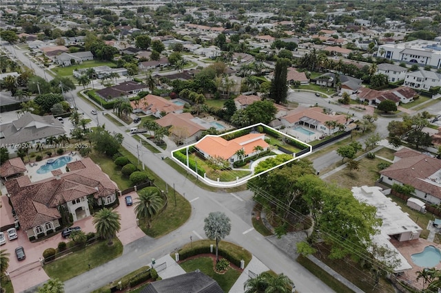 6881 SW 94th Ave, Miami, FL 33173 - aerial view of property and surrounding area featuring property parcel outlined, a pool area, and nearby suburban area