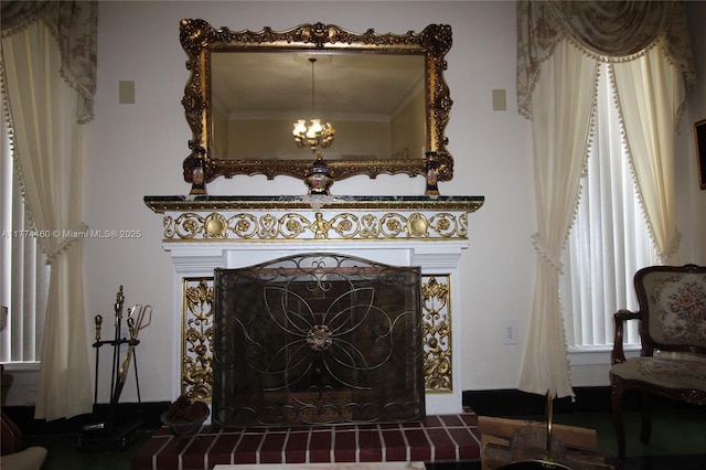 details with crown molding and a notable chandelier