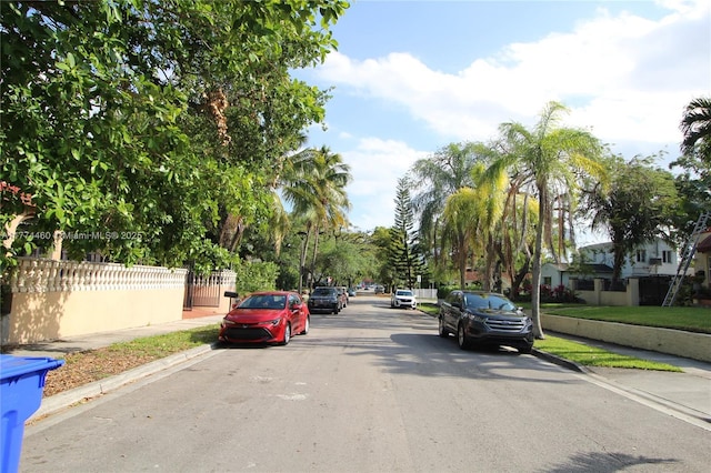 view of street with sidewalks and curbs