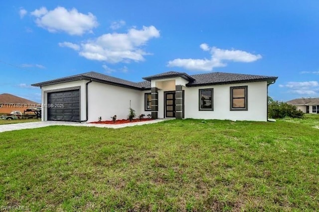 3114 39th St SW, Lehigh Acres, FL 33976 - prairie-style house featuring a front yard, stucco siding, concrete driveway, and a garage