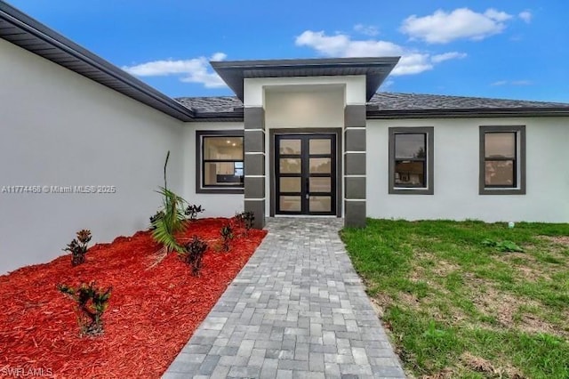 3114 39th St SW, Lehigh Acres, FL 33976 - entrance to property with stucco siding and a yard