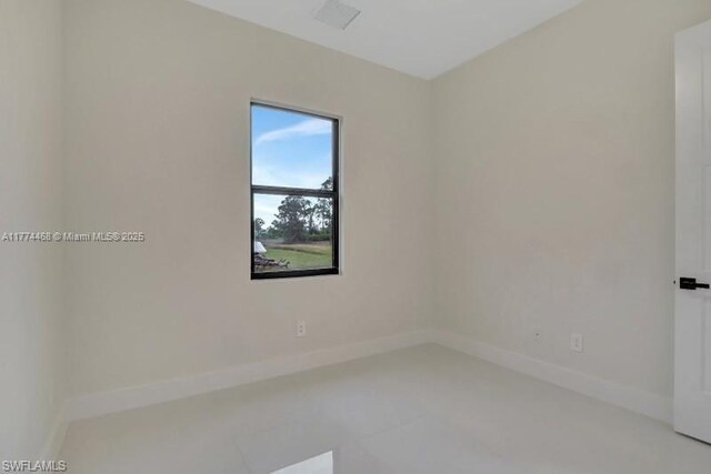 3114 39th St SW, Lehigh Acres, FL 33976 - unfurnished room with baseboards