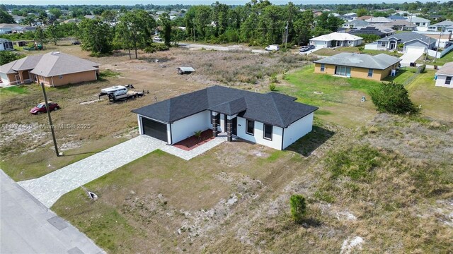3114 39th St SW, Lehigh Acres, FL 33976 - bird's eye view with a residential view