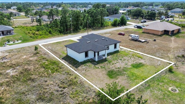 3114 39th St SW, Lehigh Acres, FL 33976 - aerial view with a residential view