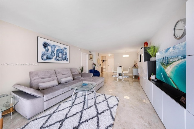 living room featuring concrete flooring