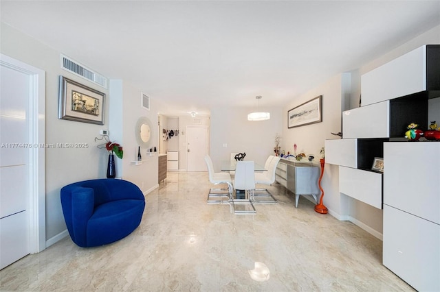 interior space featuring visible vents and baseboards
