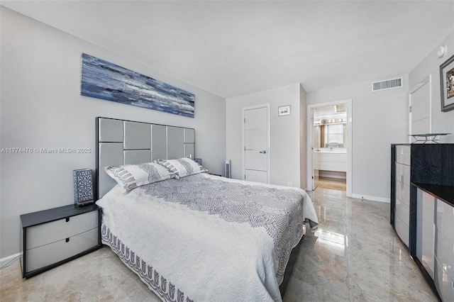bedroom featuring visible vents, baseboards, and connected bathroom