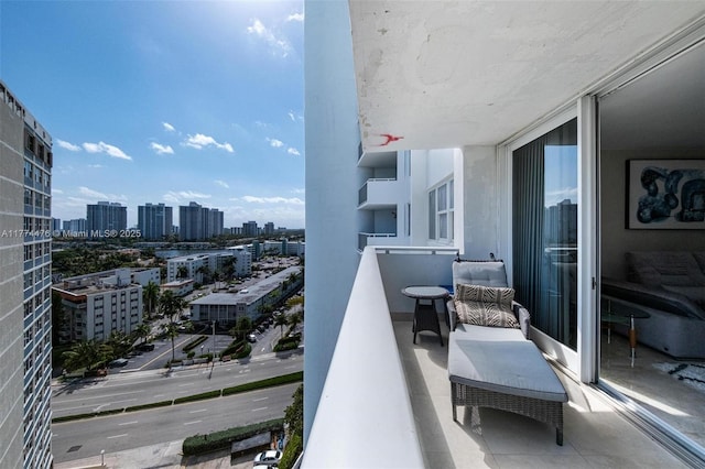 balcony featuring a view of city