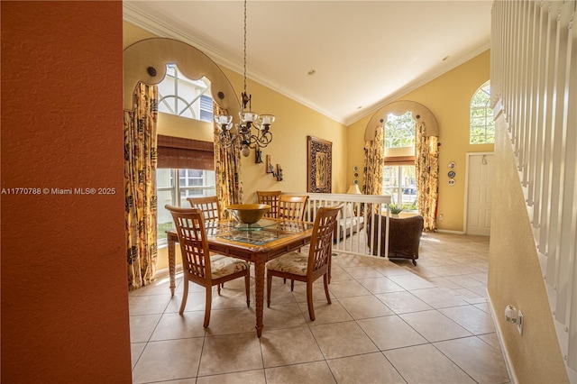 16473 SW 30th St, Miramar, FL 33027 - dining area with a chandelier, light tile patterned floors, high vaulted ceiling, and crown molding