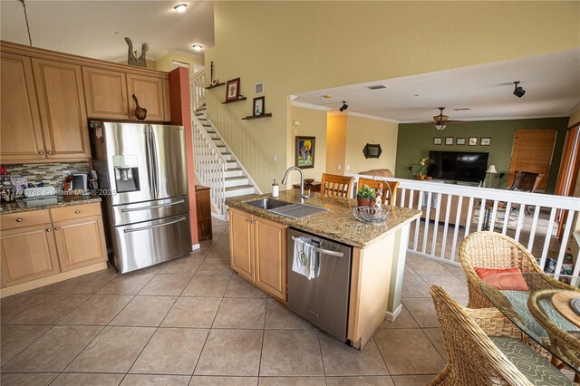 16473 SW 30th St, Miramar, FL 33027 - kitchen with stainless steel appliances, ornamental molding, a ceiling fan, open floor plan, and light tile patterned floors