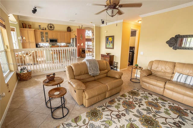 16473 SW 30th St, Miramar, FL 33027 - living room featuring light tile patterned floors, a ceiling fan, and ornamental molding