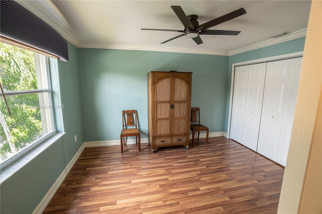 16473 SW 30th St, Miramar, FL 33027 - bedroom with multiple windows, light wood-style flooring, ornamental molding, and a closet