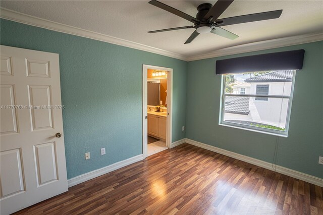 16473 SW 30th St, Miramar, FL 33027 - unfurnished bedroom featuring ornamental molding, wood finished floors, a textured wall, ensuite bathroom, and a ceiling fan
