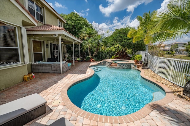 16473 SW 30th St, Miramar, FL 33027 - view of swimming pool featuring a patio area, a fenced backyard, ceiling fan, a pool with connected hot tub, and an outdoor hangout area