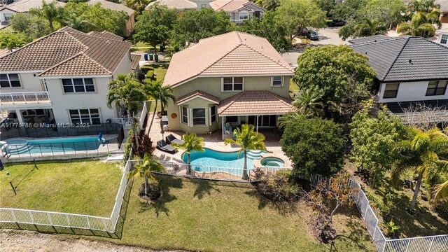 16473 SW 30th St, Miramar, FL 33027 - aerial perspective of suburban area featuring a pool area