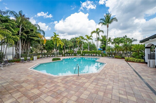 16473 SW 30th St, Miramar, FL 33027 - community pool featuring a patio area