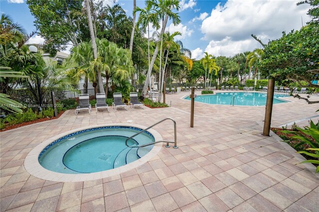 16473 SW 30th St, Miramar, FL 33027 - community pool featuring a patio