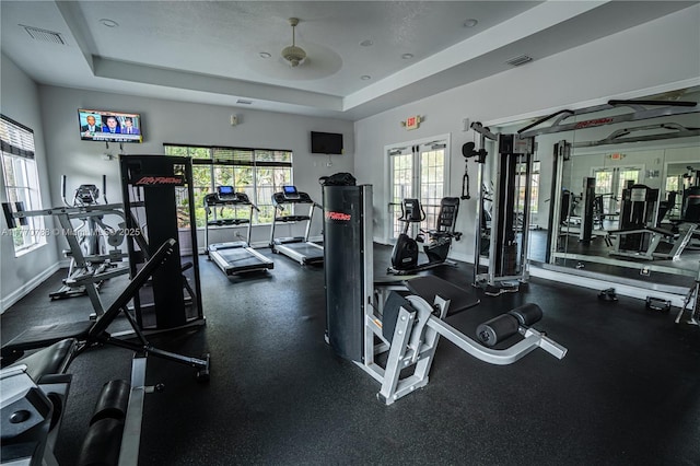 16473 SW 30th St, Miramar, FL 33027 - workout area with a tray ceiling, a ceiling fan, and french doors