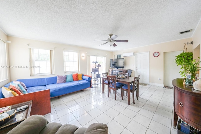 8110 NW 185th Ter, Hialeah, FL 33015 - living area with baseboards, a wall mounted air conditioner, light tile patterned floors, a textured ceiling, and ceiling fan