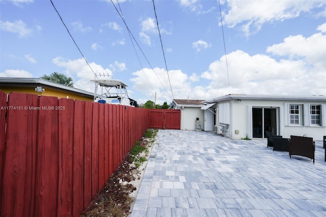 8110 NW 185th Ter, Hialeah, FL 33015 - view of patio featuring a fenced backyard