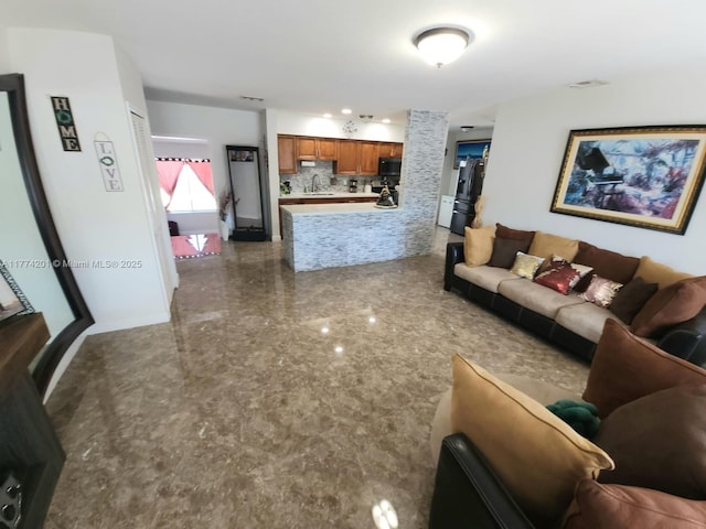 living area with baseboards