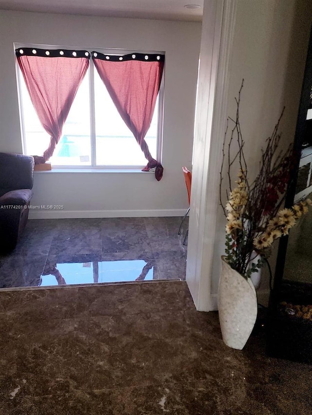bathroom featuring baseboards