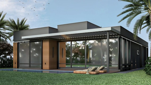 rear view of house with a sunroom