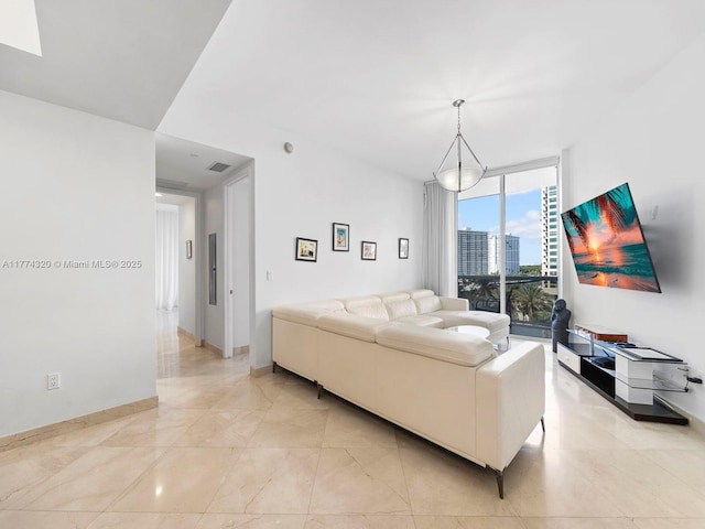 15901 Collins Ave Unit 405, Sunny Isles Beach, FL 33160 - living area featuring a wall of windows