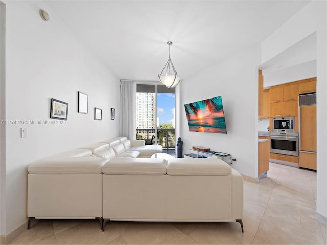 15901 Collins Ave Unit 405, Sunny Isles Beach, FL 33160 - living area with light tile patterned floors and baseboards