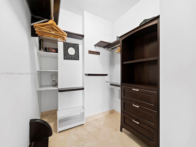 15901 Collins Ave Unit 405, Sunny Isles Beach, FL 33160 - spacious closet featuring light marble finish floors