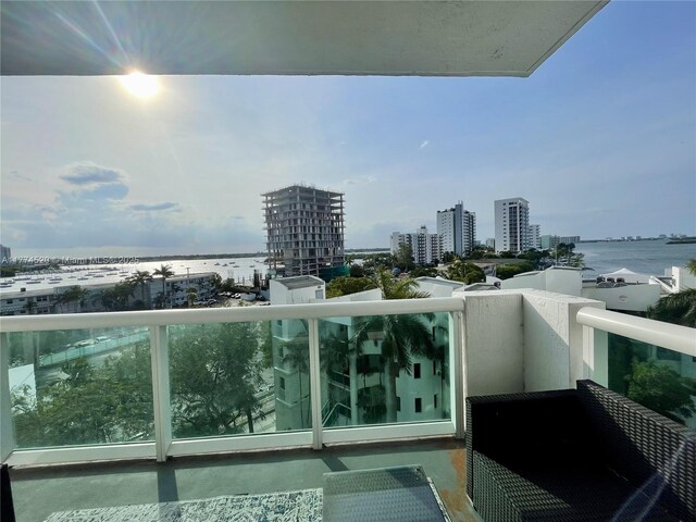 7900 Harbor Island Dr Unit 619, North Bay Village, FL 33141 - balcony with a city view and a water view