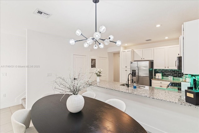 23300 SW 110th Ct, Homestead, FL 33032 - dining area with light tile patterned floors, a chandelier, visible vents, and recessed lighting