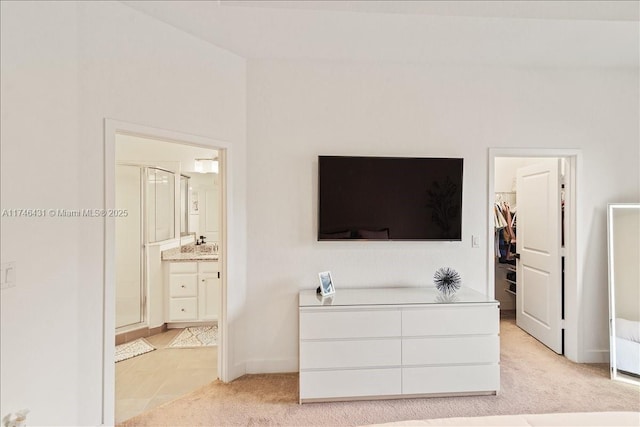 23300 SW 110th Ct, Homestead, FL 33032 - bedroom with ensuite bathroom, a closet, light colored carpet, and a walk in closet