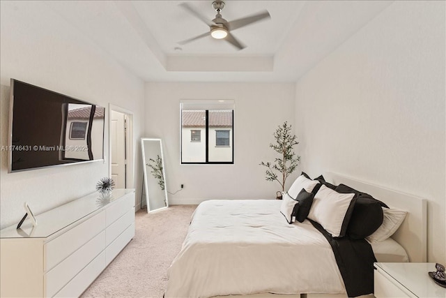 23300 SW 110th Ct, Homestead, FL 33032 - bedroom with light carpet, baseboards, a ceiling fan, and a raised ceiling