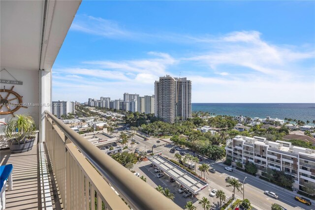 balcony with a city view and a water view