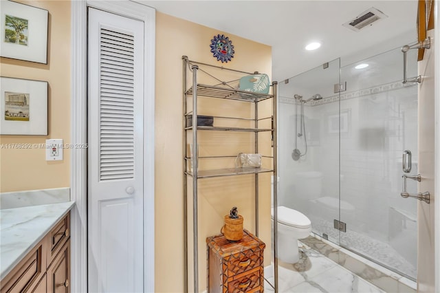 bathroom with recessed lighting, a shower stall, visible vents, toilet, and vanity