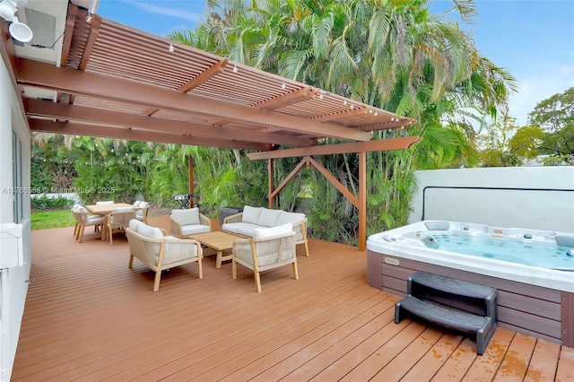 wooden terrace featuring a pergola, a hot tub, and outdoor dining area