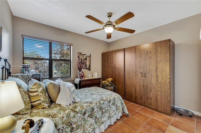 8914 SW 5th Ln, Miami, FL 33174 - bedroom with light tile patterned floors, baseboards, and ceiling fan