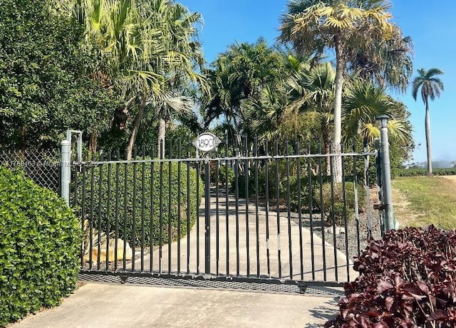 view of gate featuring fence