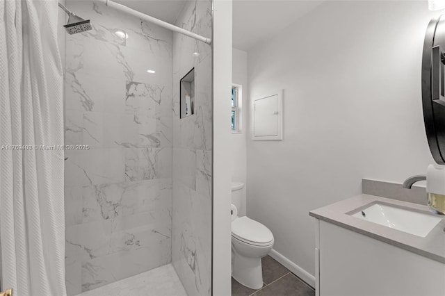 full bathroom with toilet, vanity, and a marble finish shower