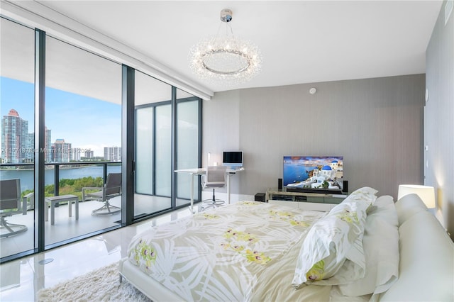 5000 Island Estates Dr Unit 704, Aventura, FL 33160 - bedroom featuring a view of city, access to outside, an inviting chandelier, and a wall of windows