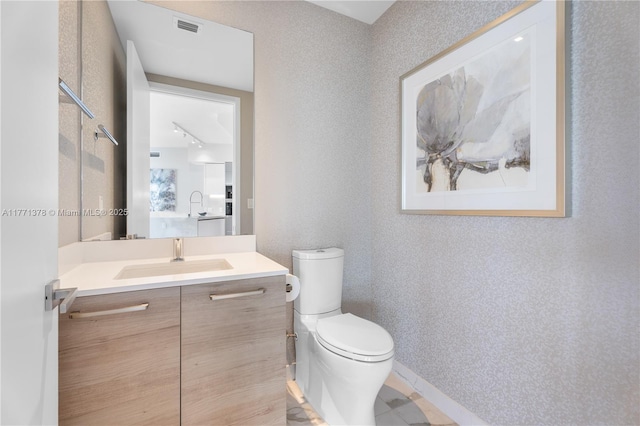 5000 Island Estates Dr Unit 704, Aventura, FL 33160 - half bathroom featuring toilet, vanity, and visible vents
