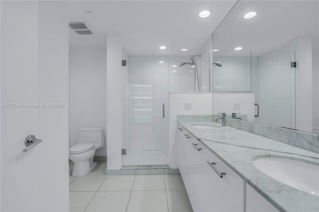 55 SE 6th St Unit 3503, Miami, FL 33131 - full bath with a shower stall, double vanity, tile patterned floors, toilet, and recessed lighting
