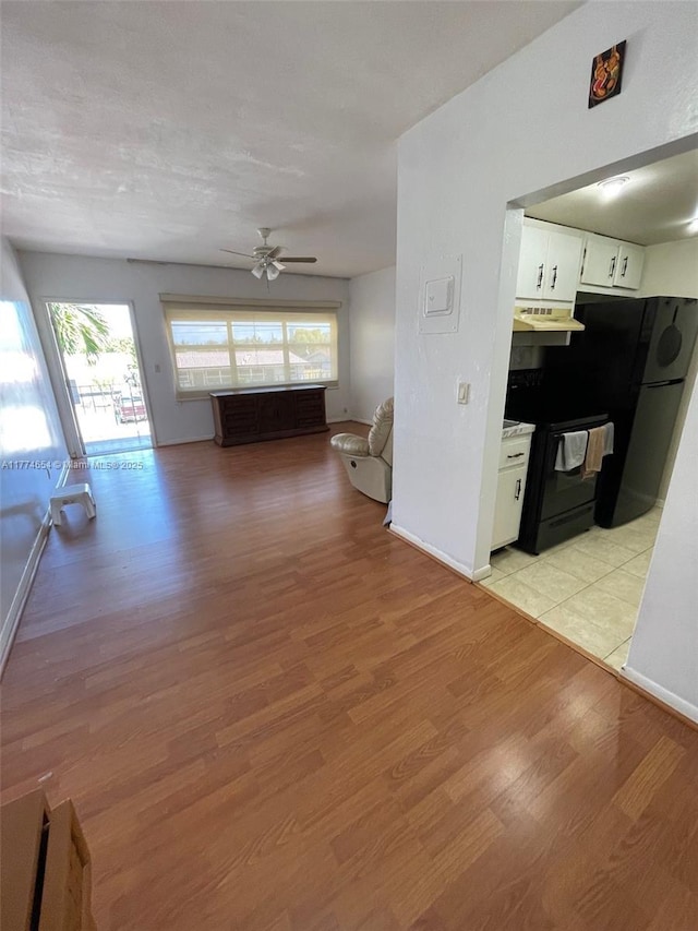 230 SW 11th Ave Unit 15, Hallandale Beach, FL 33009 - hall featuring light wood finished floors and baseboards