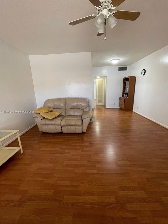 230 SW 11th Ave Unit 15, Hallandale Beach, FL 33009 - living area featuring wood finished floors, a ceiling fan, and baseboards