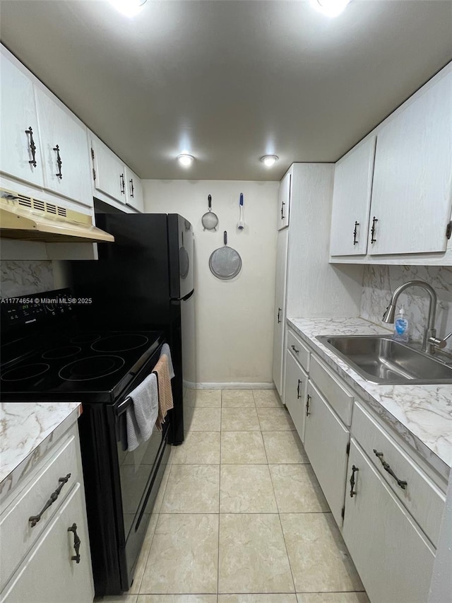 230 SW 11th Ave Unit 15, Hallandale Beach, FL 33009 - kitchen featuring black / electric stove, under cabinet range hood, a sink, and light countertops