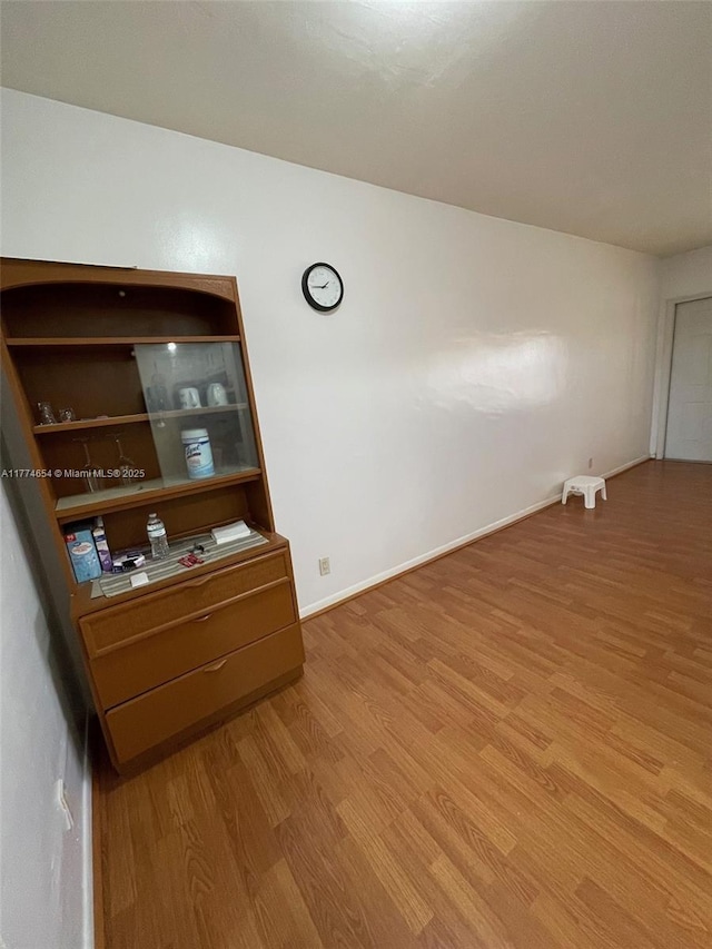 230 SW 11th Ave Unit 15, Hallandale Beach, FL 33009 - unfurnished room featuring light wood-type flooring and baseboards