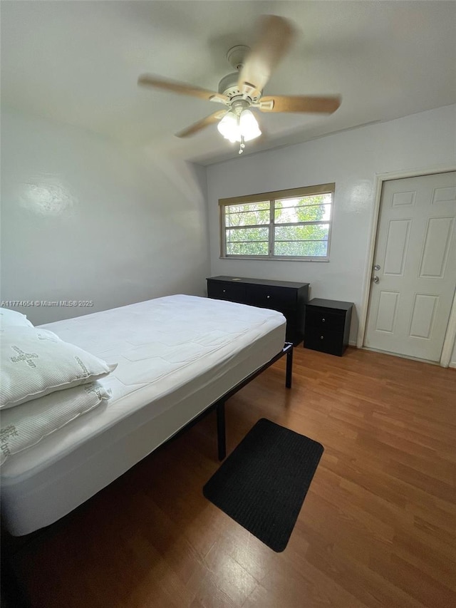230 SW 11th Ave Unit 15, Hallandale Beach, FL 33009 - bedroom with wood finished floors and a ceiling fan